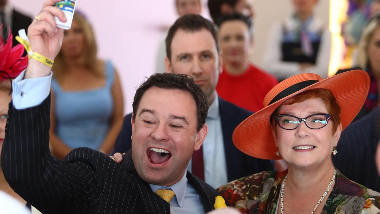 Marise Payne with her partner Stuart Ayres celebrating a win. Picture: Aaron Francis