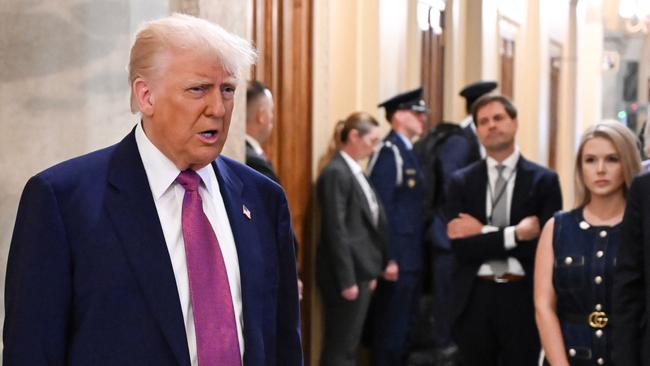 Donald Trump speaks to the press as he arrives for a House GOP conference meeting at the US Capitol. Picture; AFP