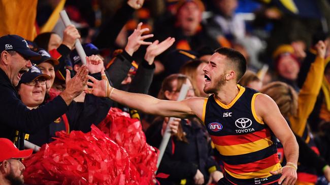 Lachlan Murphy of the Crows celebrates after kicking a goal against the Cats. Picture: Getty Images