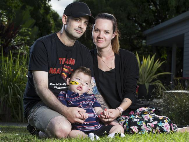 Adam Haevecker and Renee Bell with their 2 year old son Mason, who suffered brain damage after he went into cardiac arrest during heart surgery, is now in hospice care at Hummingbird House. Photo Lachie Millard