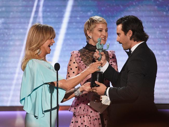 Goldie Hawn, Kate Hudson and Milo Ventimiglia onstage during the 24th Annual Screen Actors Guild Awards at The Shrine Auditorium on January 21, 2018 in Los Angeles, California. Picture: Getty