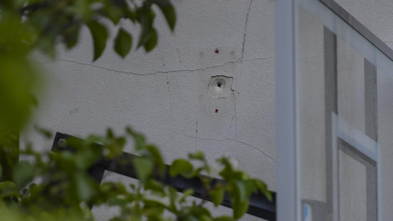 Bullet holes in the wall of the home: RoyVPhotography