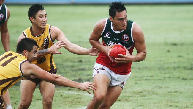 Action from the AFL Cairns match between the Manunda Hawks and the South Cairns Cutters, held at Cazalys Stadium, Westcourt. Cutters' Jermaine Wardle finds some clear air. PICTURE: BRENDAN RADKE