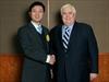 Clive Palmer (R) and WA Senate candidate Zhenya Wang