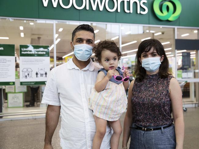 Ghasem Jahedi, Sarina Jahedi, 2 and Maryam Rahimi posing after shopping at Woolworth Nundah on the first day of the three-day lockdown. 87 Buckland Rd, Nundah, Brisbane, 9th of January 2021. (News Corp/Attila Csaszar)