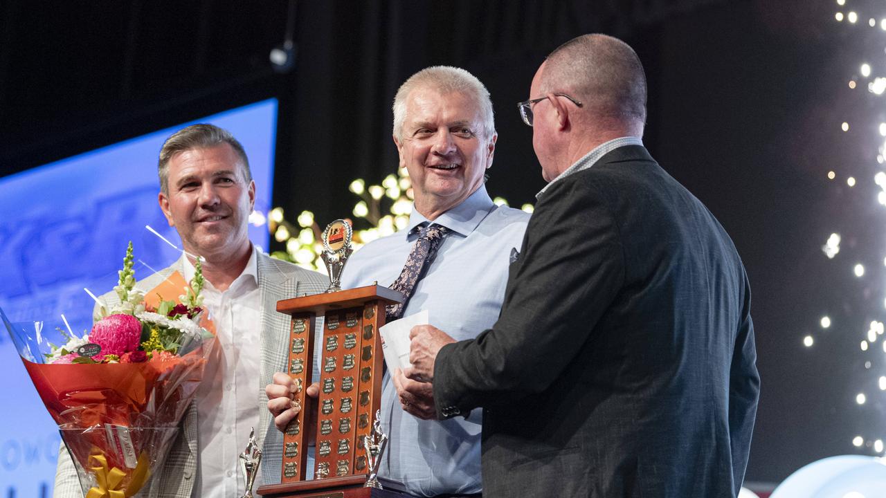 Darren Stewart (centre) accepts the Sports Darling Downs Senior Sports Star of the Year award on behalf of daughter Tatum Stewart from David Maker (left) and Paul Reedy. Picture: Kevin Farmer