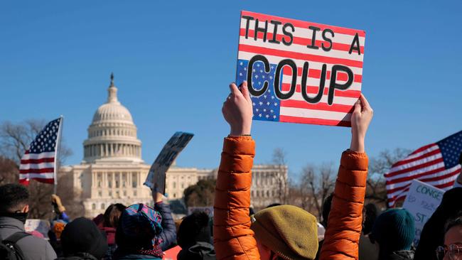 People rally during the "Not My President's Day" protest at the US Capitol.