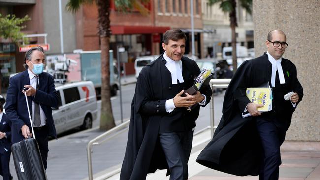 : Ben Roberts-Smith lawyers including Arthur Moses pictured (centre) as they arrive at Federal court in Sydney. Picture: NCA NewsWire / Damian Shaw