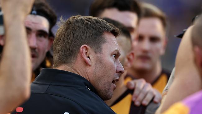 PERTH, AUSTRALIA - JUNE 30: Sam Mitchell, Senior Coach of the Hawks addresses the team at three quarter time break during the 2024 AFL Round 16 match between the West Coast Eagles and the Hawthorn Hawks at Optus Stadium on June 30, 2024 in Perth, Australia. (Photo by Will Russell/AFL Photos via Getty Images)