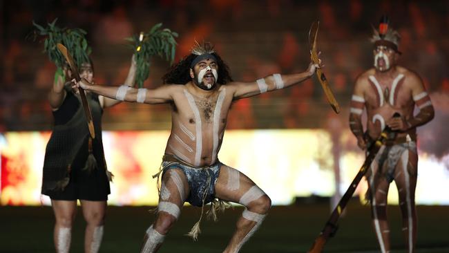 Indigenous dancers perform before game one of the 2023 State of Origin series. Photo by Cameron Spencer/Getty Images.