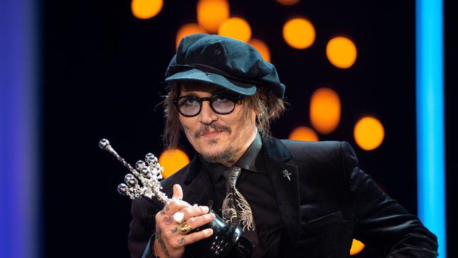 Johnny Depp accepts the Donostia Award on Wednesday night. Picture: AFP