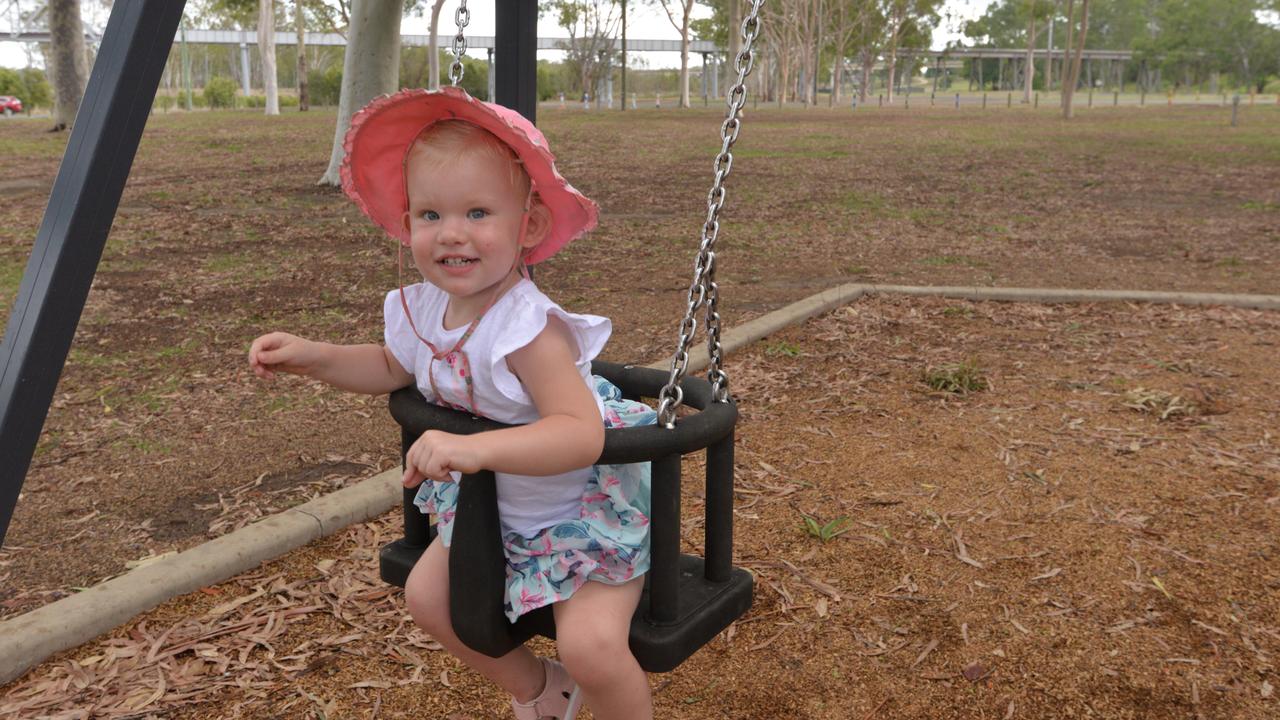 Ivy Maher goes for a swing at Lions Park, North Bundaberg.