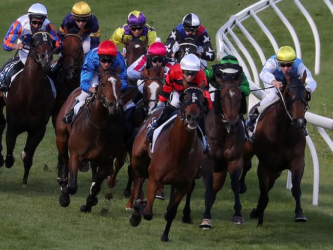 MELBOURNE, AUSTRALIA - NOVEMBER 30: Jockey Jye McNeil riding Never Again wins Race 9, Daemco Handicap during Melbourne Racing at Moonee Valley Racecourse on November 30, 2019 in Melbourne, Australia. (Photo by George Salpigtidis/Getty Images)