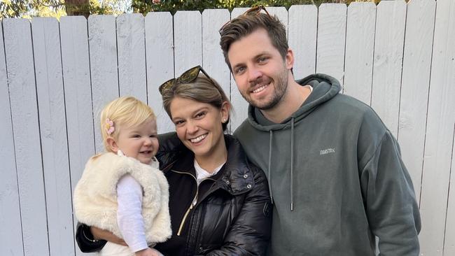 Mitch Keough and partner Amelia Perry with Charlotte, 15 months. Picture: iStock