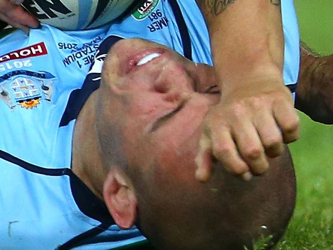 SYDNEY, AUSTRALIA - MAY 27: David Klemmer of the Blues is tackled by Corey Parker of the Maroons during game one of the State of Origin series between the New South Wales Blues and the Queensland Maroons at ANZ Stadium on May 27, 2015 in Sydney, Australia. (Photo by Mark Kolbe/Getty Images)