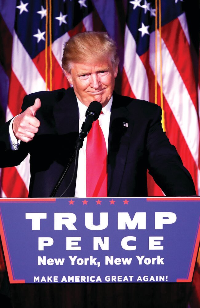 Republican president-elect Donald Trump gives a thumbs up to the crowd during his acceptance speech. Picture: Mark Wilson/Getty Images.