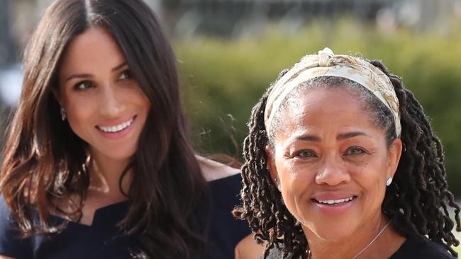 There was early speculation that Meghan Markle’s mother, Doria Ragland, might walk her down the aisle.