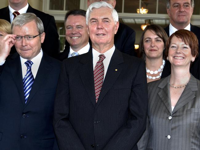 Aust politician treasurer Wayne Swan with Prime Minister Kevin Rudd, deputy PM Julia Gillard and the Governor General Major General Michael Jeffery (c) at Government House in Canberra after being sworn in as the new Prime Minister and federal government 03 Dec 2007. cabinet politicians swearing