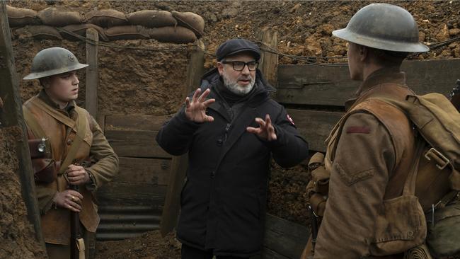 Sam Mendes with actors Dean-Charles Chapman and George MacKay on the set of 1917. Picture: AP