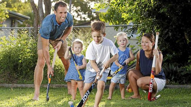 GAMES HONOUR: The Australian hockey team captain Mark with his family: Frankie, Luca, Flynn and wife Kelly Knowles at their home in Brisbane. Picture: AAP Image/Josh Woning