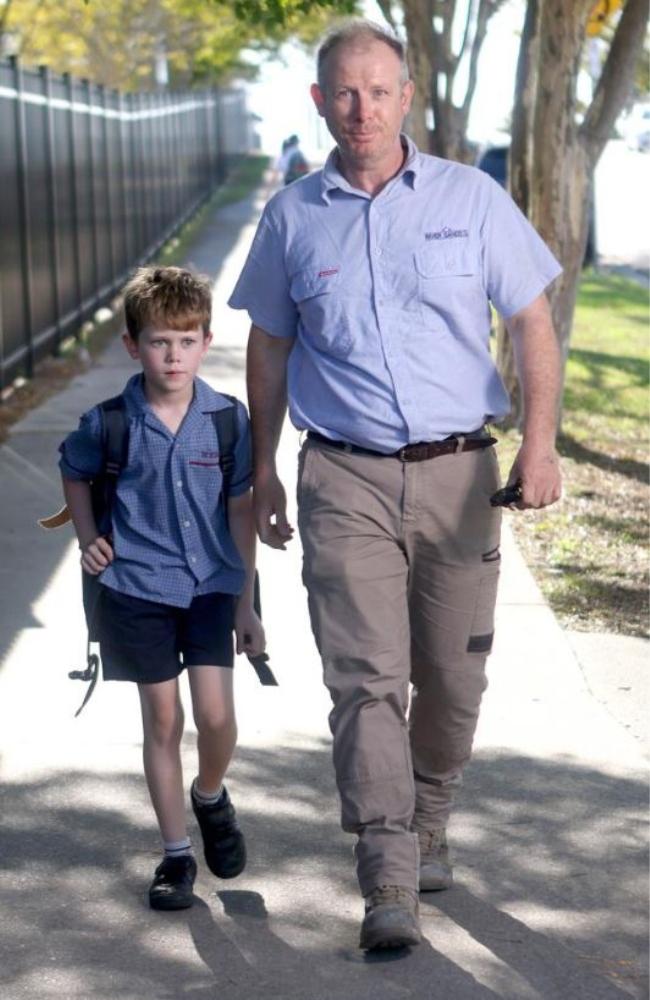 Fursey Whyte with son Ollie, 9. Picture: Steve Pohlner