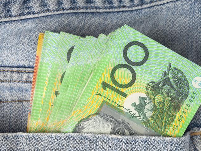 Australian 100 dollar notes in jeans pocket. money, wealthy, rich generic