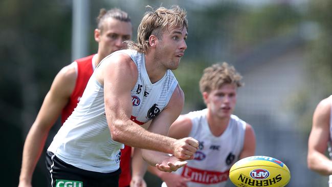 Young ruckman Max Lynch earned a Collingwood debut as the club juggled its players during a gruelling run.