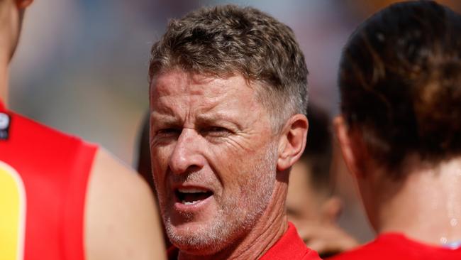 ADELAIDE, AUSTRALIA - APRIL 07: Damien Hardwick, Senior Coach of the Suns addresses his players at water time during the 2024 AFL Round 04 match between the Gold Coast SUNS and GWS GIANTS at Adelaide Hills - Mt Barker on April 07, 2024 in Adelaide, Australia. (Photo by Dylan Burns/AFL Photos via Getty Images)