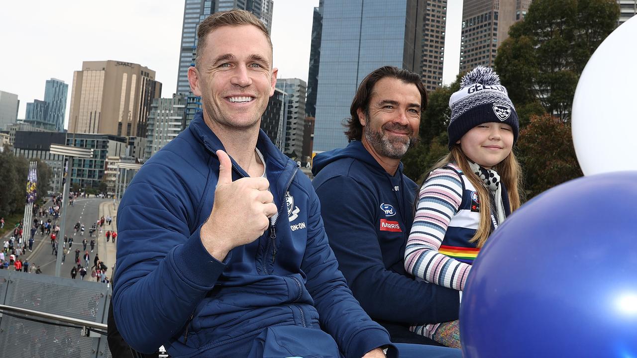 Geelong’s Joel Selwood and Chris Scott during todays parade. Picture by Michael Klein