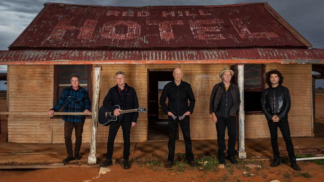 Sydney rock band Midnight Oil – (from left) Rob Hirst, Martin Rotsey, Peter Garrett, Jim Moginie and Adam Ventoura – at a homestead in Silverton, before performing at the Mundi Mundi Bash music festival near Broken Hill, NSW. Picture: Matt Williams