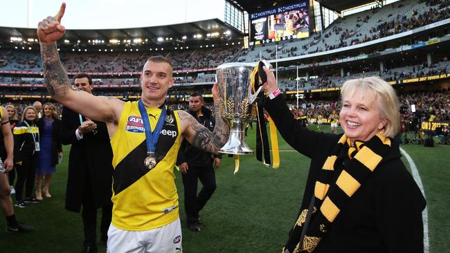 Dustin Martin and Peggy O’Neal with the 2017 premiership cup. Picture. Phil Hillyard