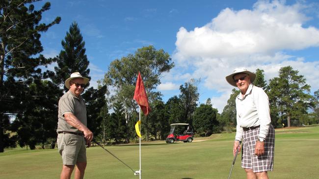 Peter Reilly and Mike Cobb enjoy a return to competition play at the Gympie Golf Course.