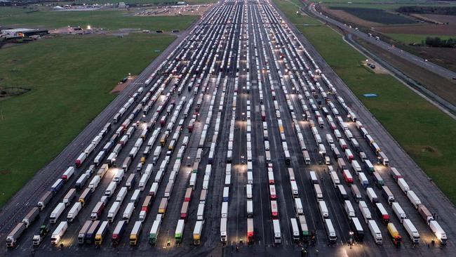 Lines of trucks on the tarmac at Manston Airport near Ramsgate, southeast England, after France closed its borders due to the new coronavirus strain. Picture: AFP