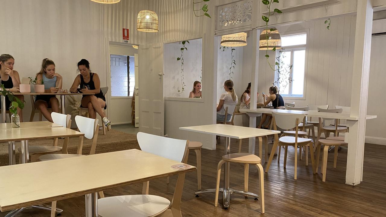 The upstairs dining space at Plant Vibes Cafe in Bowen Hills.