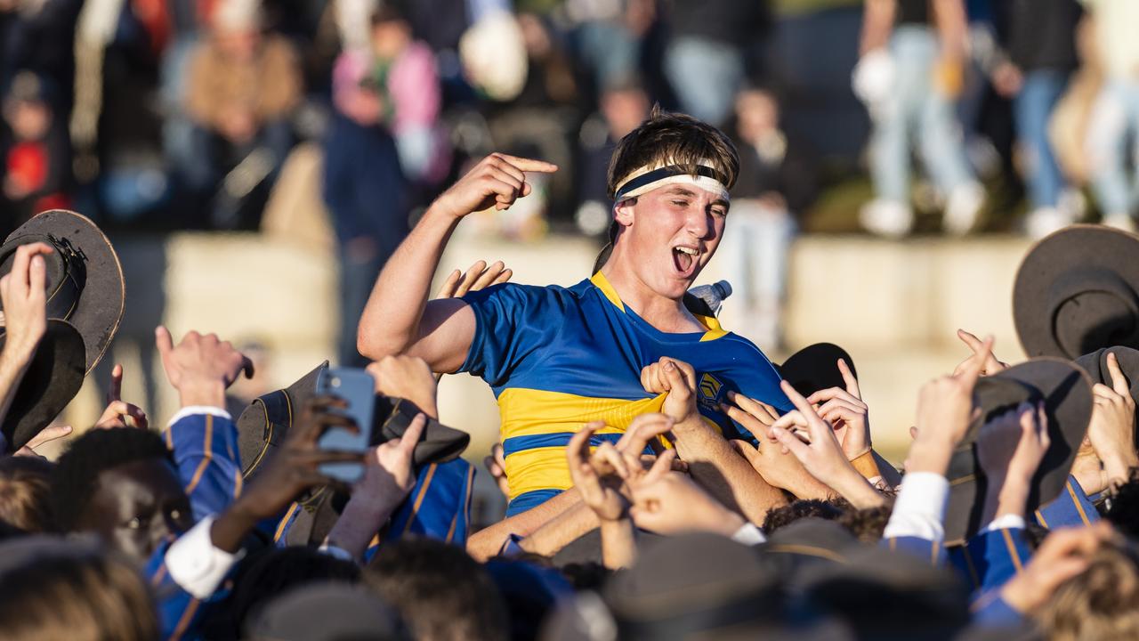 TGS First XV captain Charlie Horn is lifted by the student body in celebration after defeating Downlands to claim the O'Callaghan Cup on Grammar Downlands Day at Downlands College, Saturday, August 6, 2022. Picture: Kevin Farmer