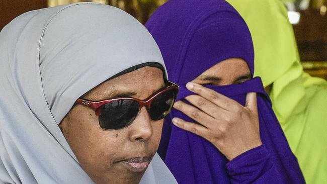 Zainab Abdirahman Khalif, in purple, leaves court following her acquittal in October. Picture: AAP/Roy Vandervegt.