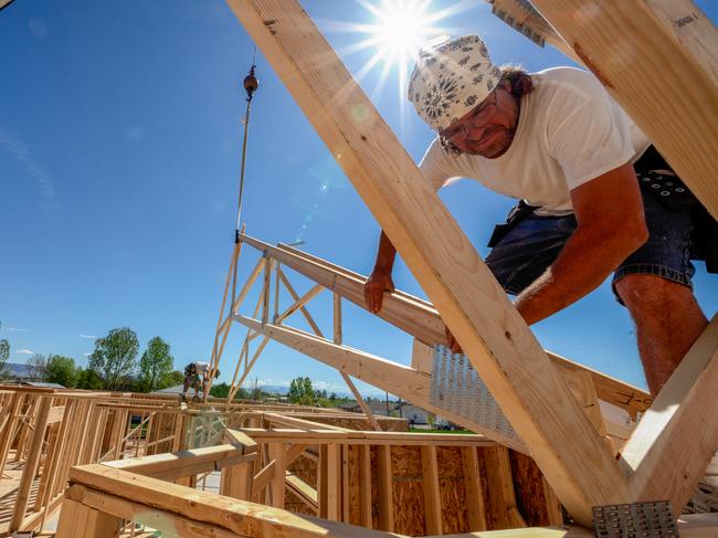 Drone View of a Home being Framed by Carpenters