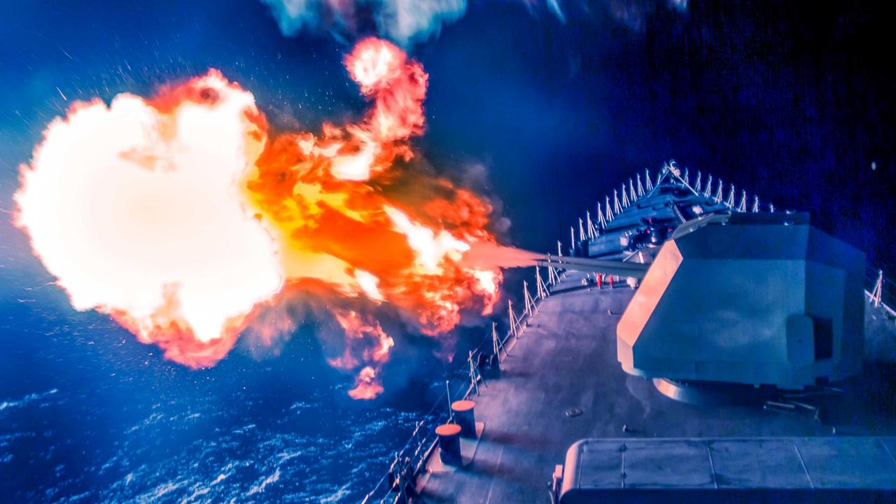 The guided-missile destroyer Shenzhen (Hull 167) attached to a destroyer flotilla with the navy under the PLA Southern Theater Command fires its main-gun at night during a around-the-clock maritime training exercise in waters off the South China Sea. Picture: eng.chinamil.com.cn/PLA