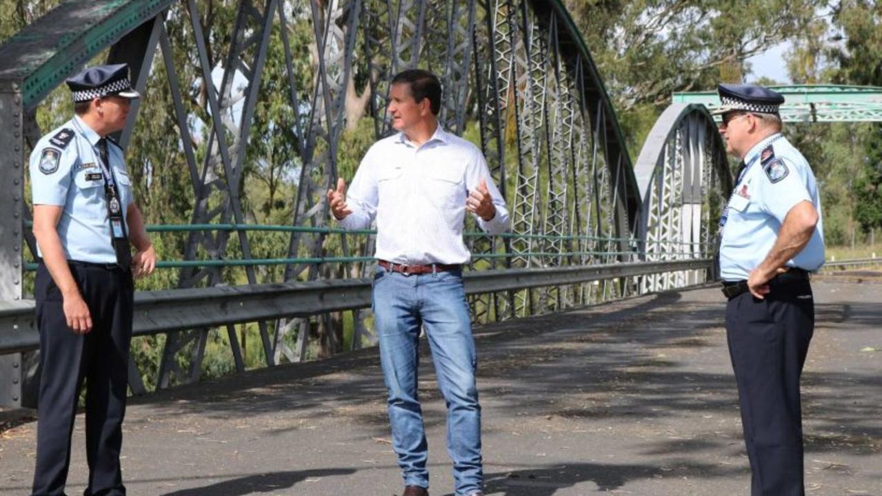 Discussing the border are (from left) Queensland Police Superintendent Mark Kelly (left) Goondiwindi Mayor Lawrence Springborg and Assistant Commissioner Mike Condon at Goondiwindi's old Macintyre Bridge.