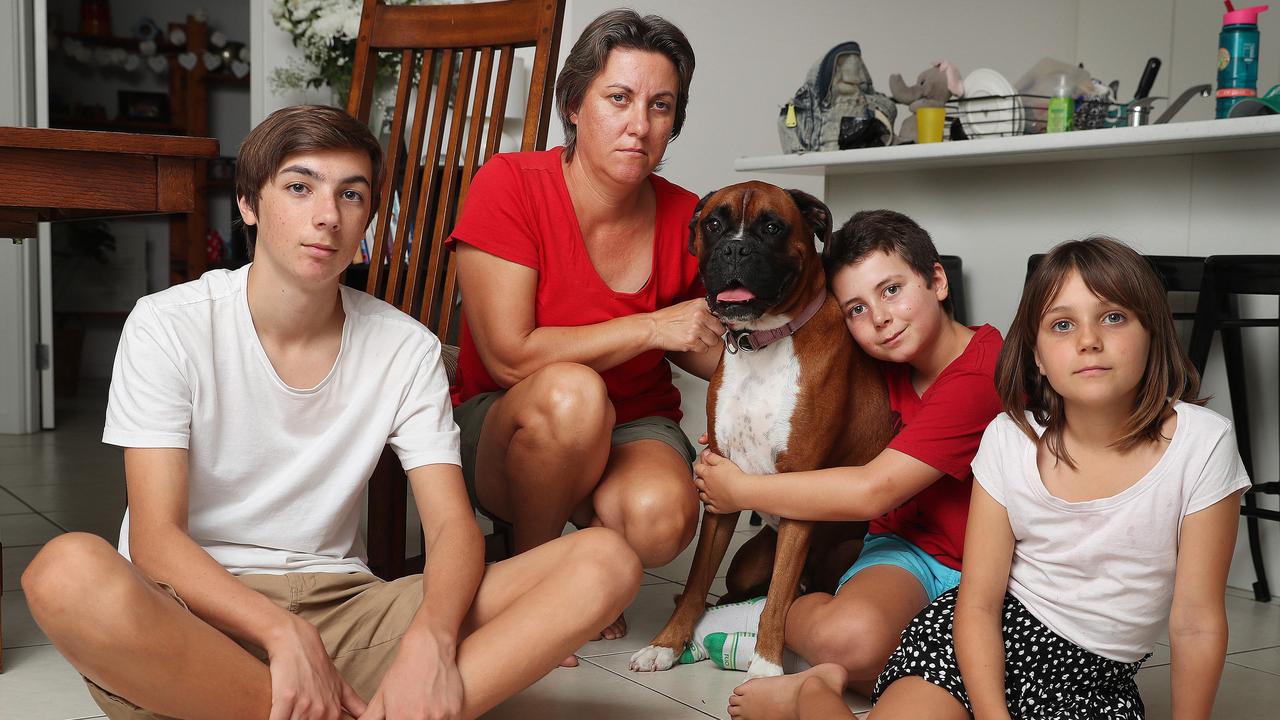 Catherine Frewer, widow of cyclist Cameron Frewer, with their three kids Lachlan, Heidi and Oscar, pictured with their dog Herbie. Picture: Peter Wallis