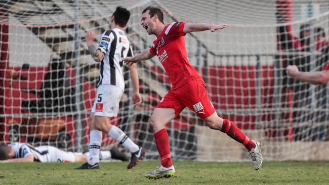 Alex Mullen celebrates a goal for reigning NPL SA champion Campbelltown City. Picture: Adam Butler