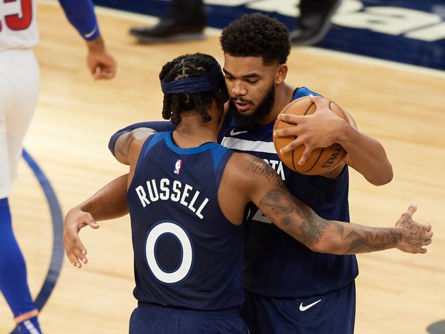 D'Angelo Russell made sure Karl-Anthony Towns got the game ball. (Photo by Hannah Foslien/Getty Images)