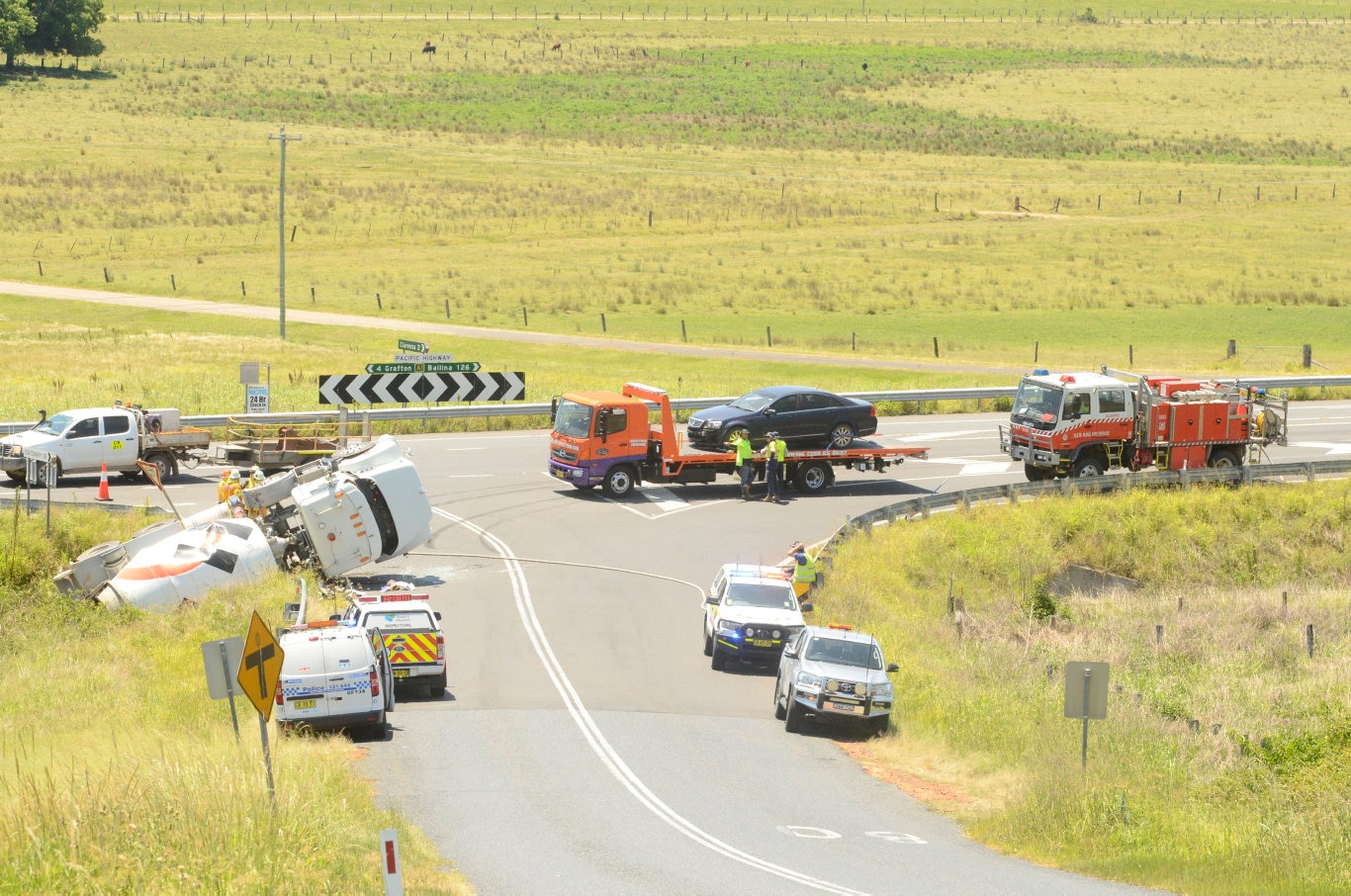 A cement truck came to rest in a ditch near the Pacific Highway, Centenary Drive intersection, north of Grafton, NSW. Picture: Jarrard Potter