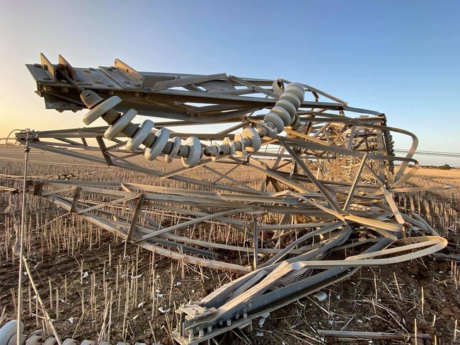 Fallen transmission towers north of Cressy, Victoria. A severe storm caused them to topple on January 31, 2020. Picture: Supplied/Chris Cutajar