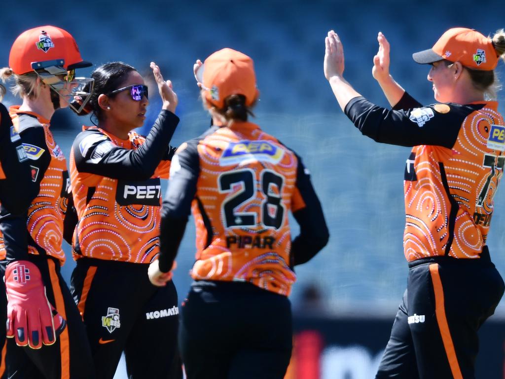Alana King celebrates a wicket with her Perth Scorchers teammates during the 2021 WBBL competition. Picture: Getty Images