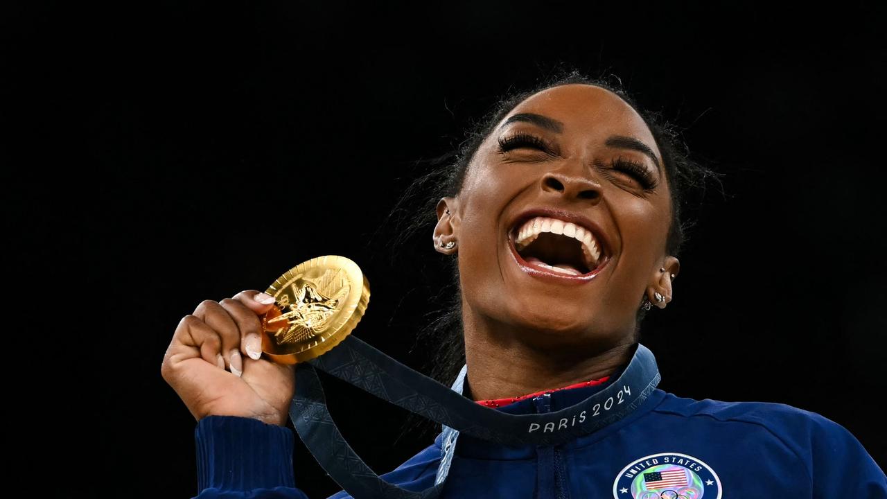 Gymnastics GOAT Simone Biles wants the media to give athletes time to take in these moments. Picture: Paul Ellis/AFP