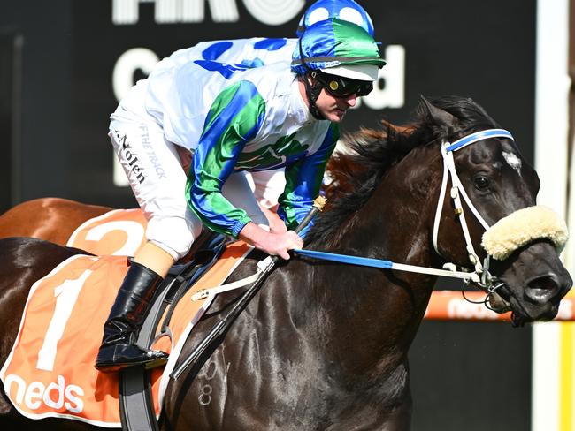 MELBOURNE, AUSTRALIA - SEPTEMBER 23: Luke Nolen riding I Wish I Win gallops alongside Boogie Dancer in between races during Melbourne Racing at Caulfield Racecourse on September 23, 2023 in Melbourne, Australia. (Photo by Vince Caligiuri/Getty Images)