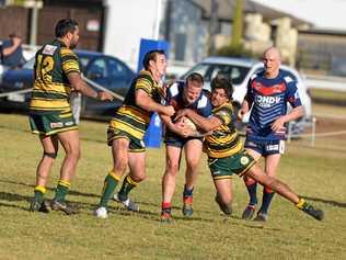 BATTLING THROUGH: Jarred Bradfield on the attack for Warwick against Wattles at Platz Oval. Picture: Gerard Walsh