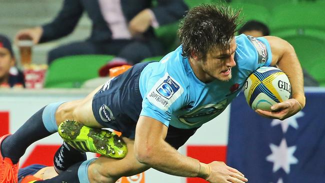 MELBOURNE, AUSTRALIA - MAY 23: Rob Horne of the Waratahs scores a try in the corner during the round 15 Super Rugby match between the Rebels and the Waratahs at AAMI Park on May 23, 2014 in Melbourne, Australia. (Photo by Scott Barbour/Getty Images)