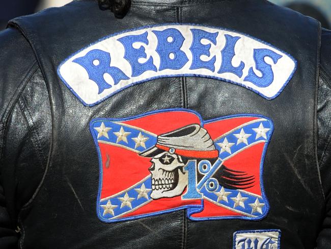 ** FILE ** A June 13, 2009 file photo of a member of the Rebels MC at Moore, Sydney. The High Court has declared as unconstitutional South Australia's controversial bikie laws banning members from associating Thursday, Nov. 11, 2010. (AAP Image/Dean Lewins, Files) NO ARCHIVING